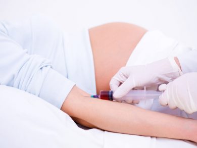 pregnant woman getting blood test